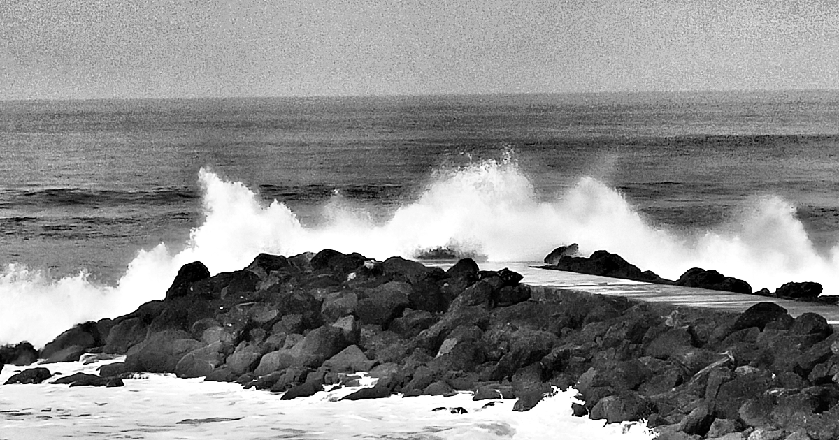Photo-poème : Rien n'arrête la vague