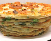 Pains frits aux oignons verts et persil - Recette en vidéo