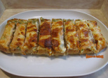 Pain gratiné au saumon fumé et au fromage